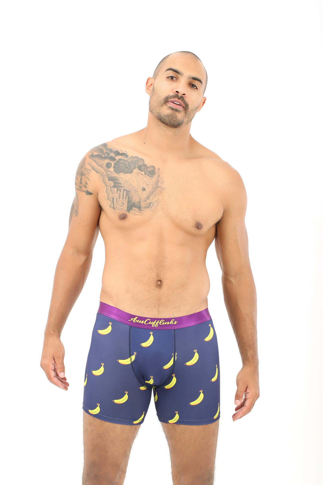 A man strikes a pose in the luxurious Banana Underwear against a plain white background.