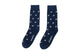 A pair of Basketball Dunk Socks with white stars on them.