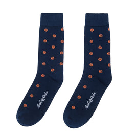 A pair of blue Basketball Socks with orange balls on them.