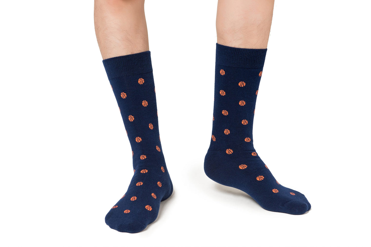 A pair of legs wearing basketball socks.