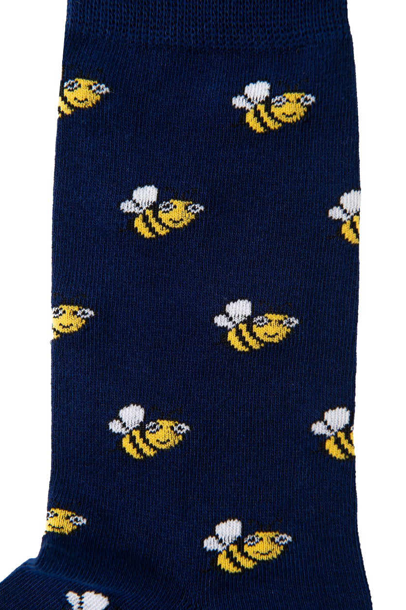 Bee Socks: Navy blue socks with a repeating pattern of small yellow and black cartoon bees featuring white wings—ideal for adding nature-inspired style to your wardrobe.
