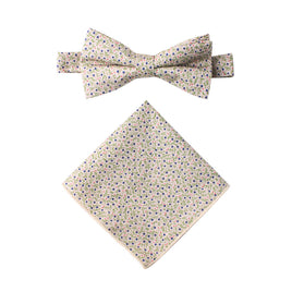A Blue Forget-Me-Nots Floral Cotton bow tie and pocket square exuding timeless charm on a white background.