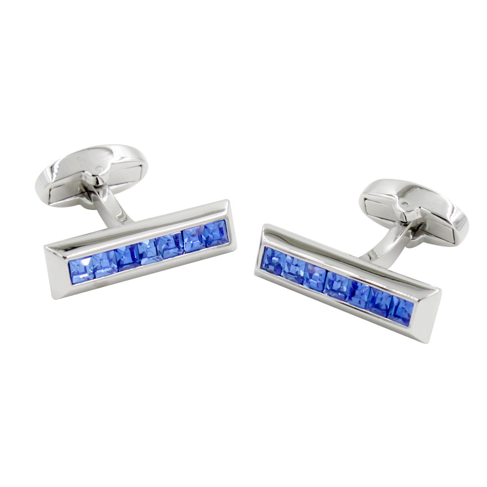 A pair of Blue Ice Cufflinks on a white background.