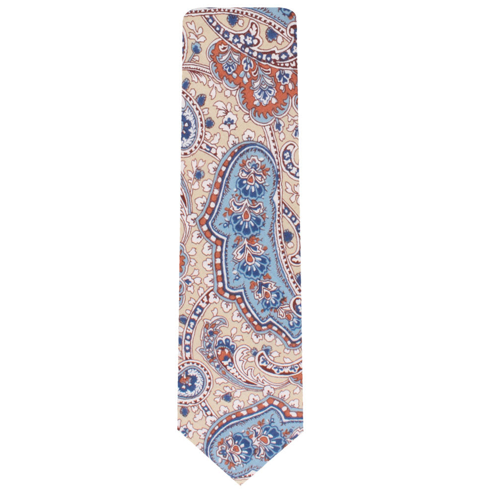 The Blue Latte Brown Paisley Skinny Necktie and Pocket Square Set exudes charm with its beige background, enhanced by an intricate paisley design in shades of blue, orange, and white.