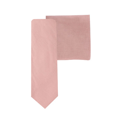 A blush pink necktie and pocket square in subtle hues on a white background.
