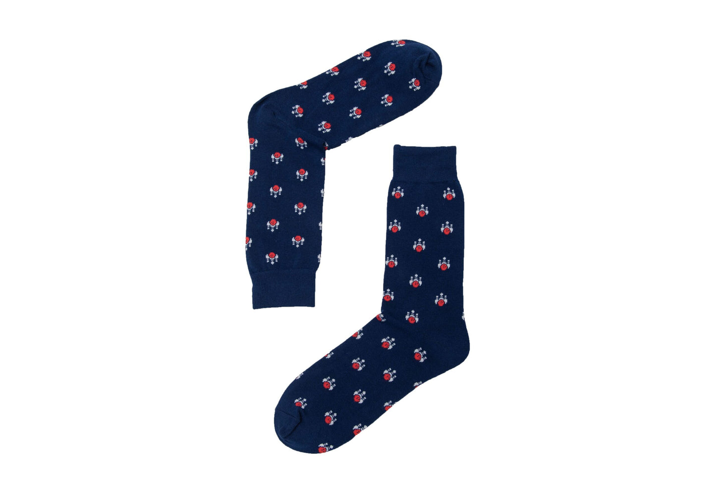 The Ten Pin Socks, featuring a small red and white flower pattern arranged in the shape of an uppercase "L" on a navy blue background, provide a striking style to start the day with confidence.