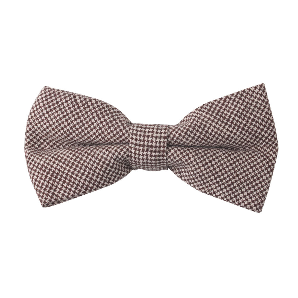 The Brown Mini Houndstooth Cotton Bow Tie from the pocket square set rests on a white background, radiating timeless elegance.