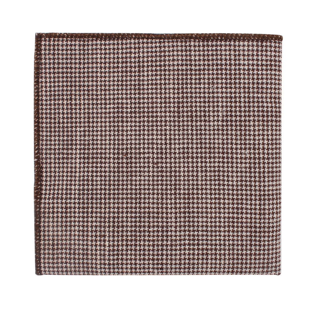 The Brown Mini Houndstooth Cotton Bow Tie & Pocket Square Set exudes classic, timeless elegance with its square piece of brown and white fabric.