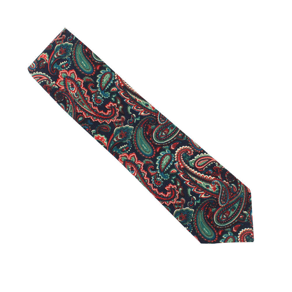 A Carpe diem Paisley Skinny Cotton Tie making a bold fashion statement on a white background.