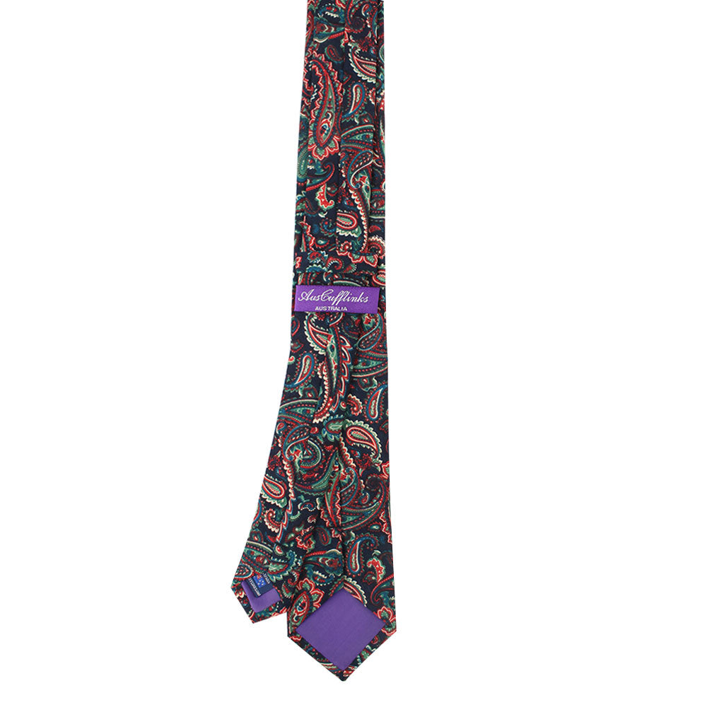 A Carpe diem Paisley Skinny Cotton Tie with a statement paisley pattern on it.