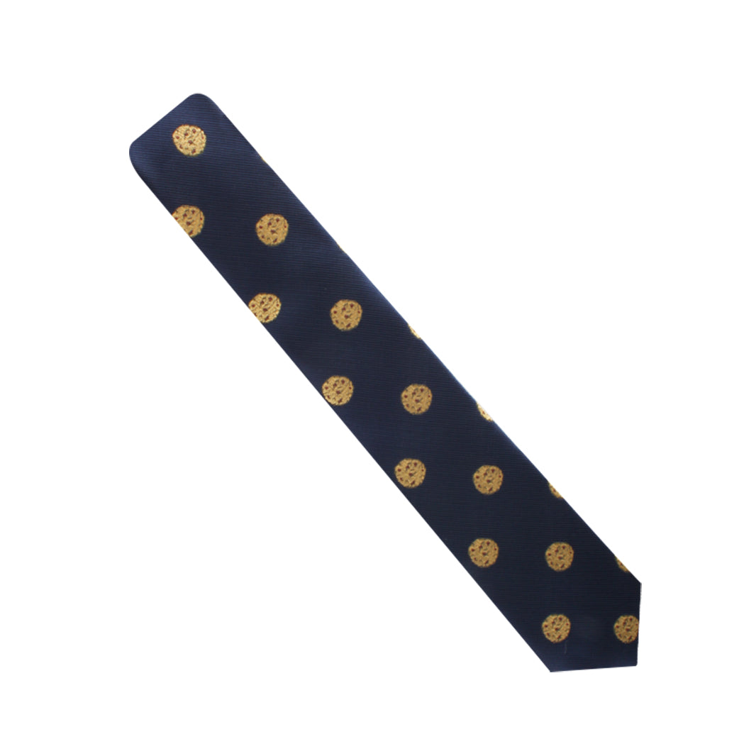 A Chocolate Chip Tie with gold dots on it, adding a touch of sweetness to your timeless style.