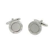 The Inner Circle Silver Cufflinks feature a round design with a textured inner circle and polished outer rim, completed with T-bar closures.