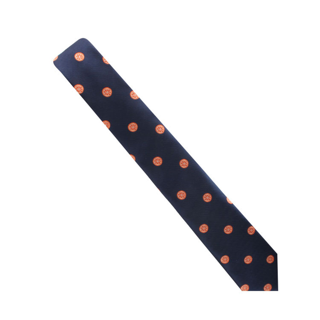An Citrus Print Tie with an orange dot pattern, displayed diagonally against a white background.