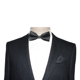 A mannequin wearing a sharp black suit with a Classic Black Bow Tie, perfect for formal occasions.