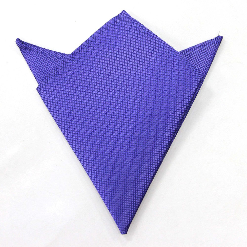 The Purple Pocket Square with pointed ends, elegantly folded on a white background, is perfect for the modern gentleman's wedding ensemble.