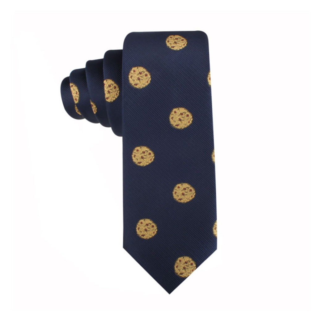 A navy Cookies Thin Tie with gold cookies on it, adding a touch of sweetness to its timeless style.