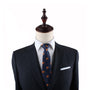 A mannequin in a Croissant Slim Tie and suit.