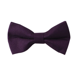 A dark purple bow tie on a midnight canvas.