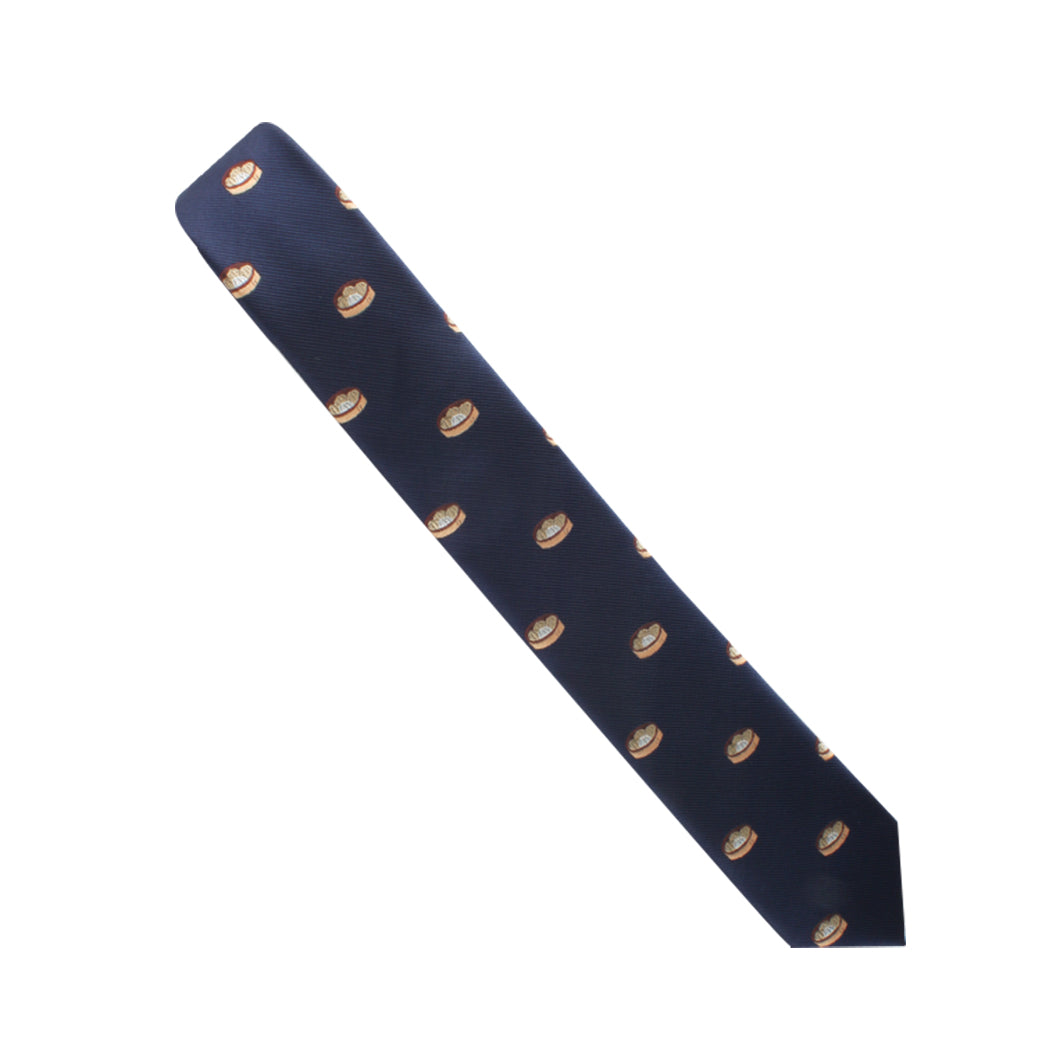 Sure, here is the revised sentence:
A navy blue Dimsum Skinny Tie with a repeating pattern of small, circular cartoonish images adds a touch of timeless elegance to any ensemble.