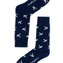 Dove Socks: Navy blue socks featuring a repeating white dove pattern and cursive writing on the soles.