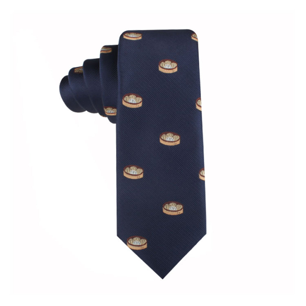 A Dumplings Thin Tie with small repeating images of cheese wheels printed on it, offering a touch of culinary inspiration and timeless elegance.
