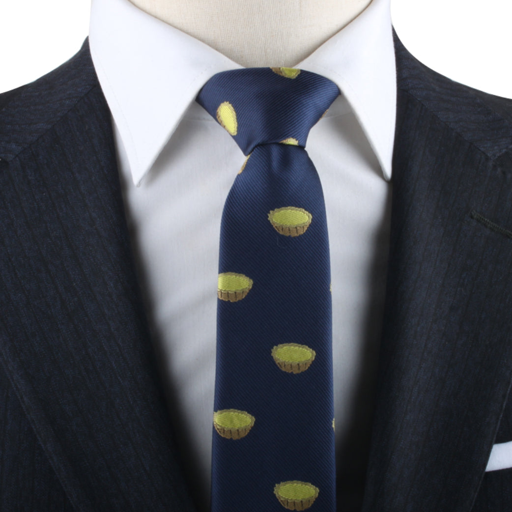 Close-up of a person wearing a dark pinstripe suit and white shirt with the Egg Tart Necktie, showcasing an exquisite blend of fashion and pastry charm.