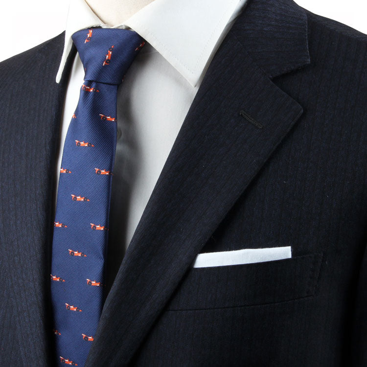A mannequin embodying perfect harmony and sophistication by sporting a Fast Car Necktie.