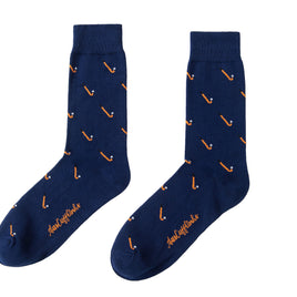 A pair of Field Hockey Socks with orange and white design.