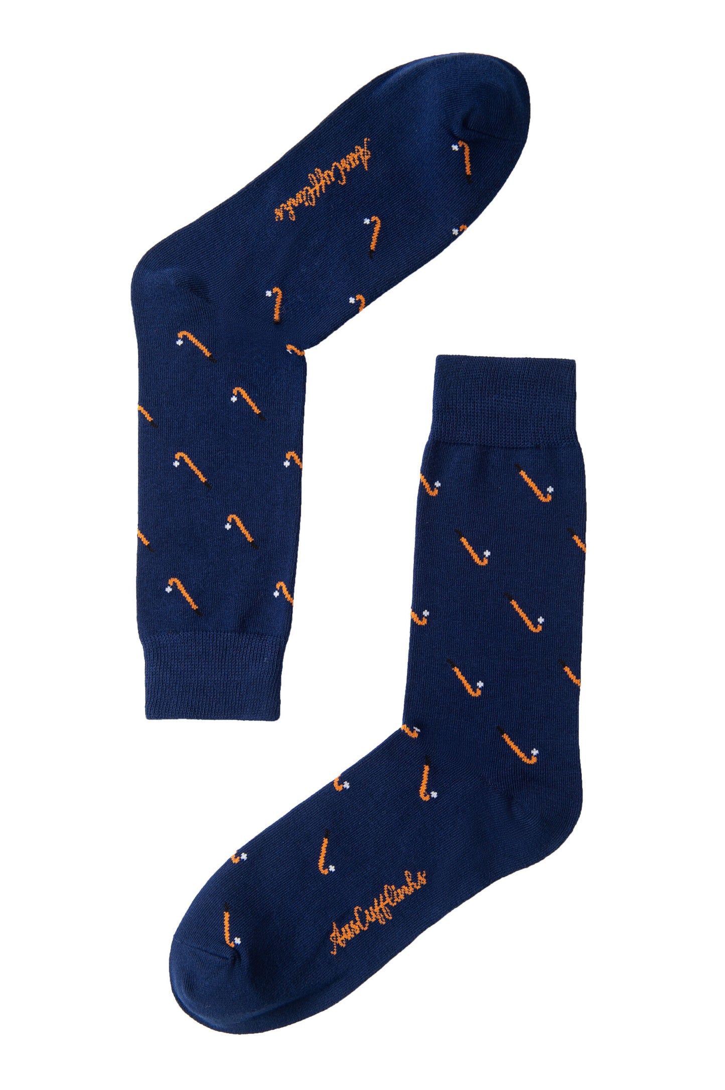 A pair of navy blue Field Hockey Socks featuring moisture-wicking fabric, small orange candy cane patterns, and orange cursive writing near the cuffs, shown on a white background.