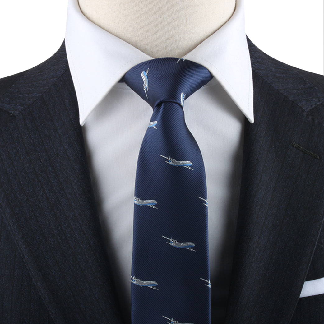 Close-up of a person in a dark pinstriped suit and white dress shirt, wearing an Aeroplane Skinny Tie. The overall look exudes charm and style with an aeronautical touch.
