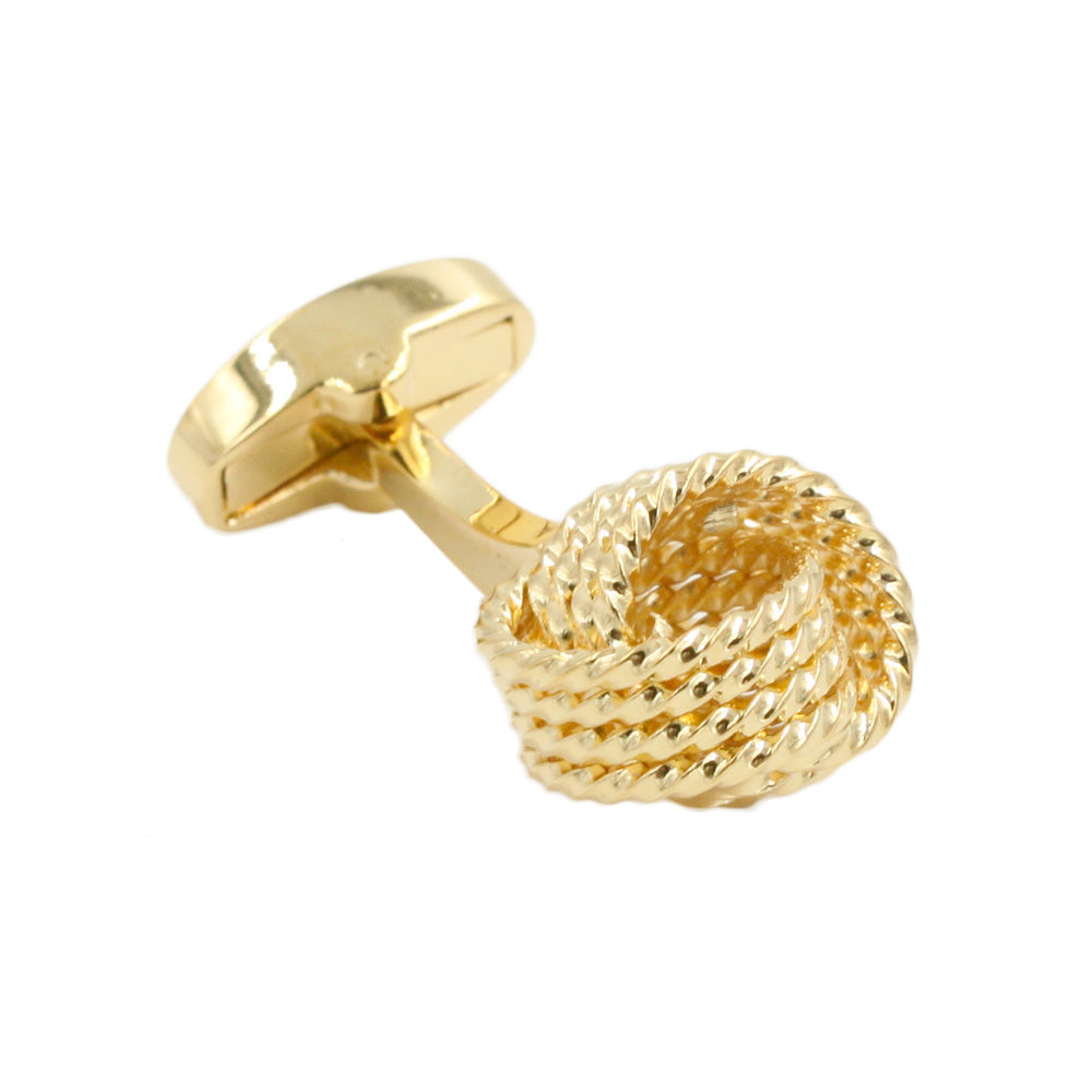 Introducing the Gold Knot Premium Cufflinks: a luxurious accessory for the discerning gentleman. Featuring a twisted knot design crafted from coiled metal strands and elegantly attached to an oval-shaped backing, they are perfect for those who appreciate timeless elegance and refined style.
