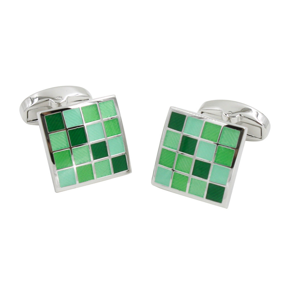 A pair of Coral Green Cufflinks with a polished finish on a white background.