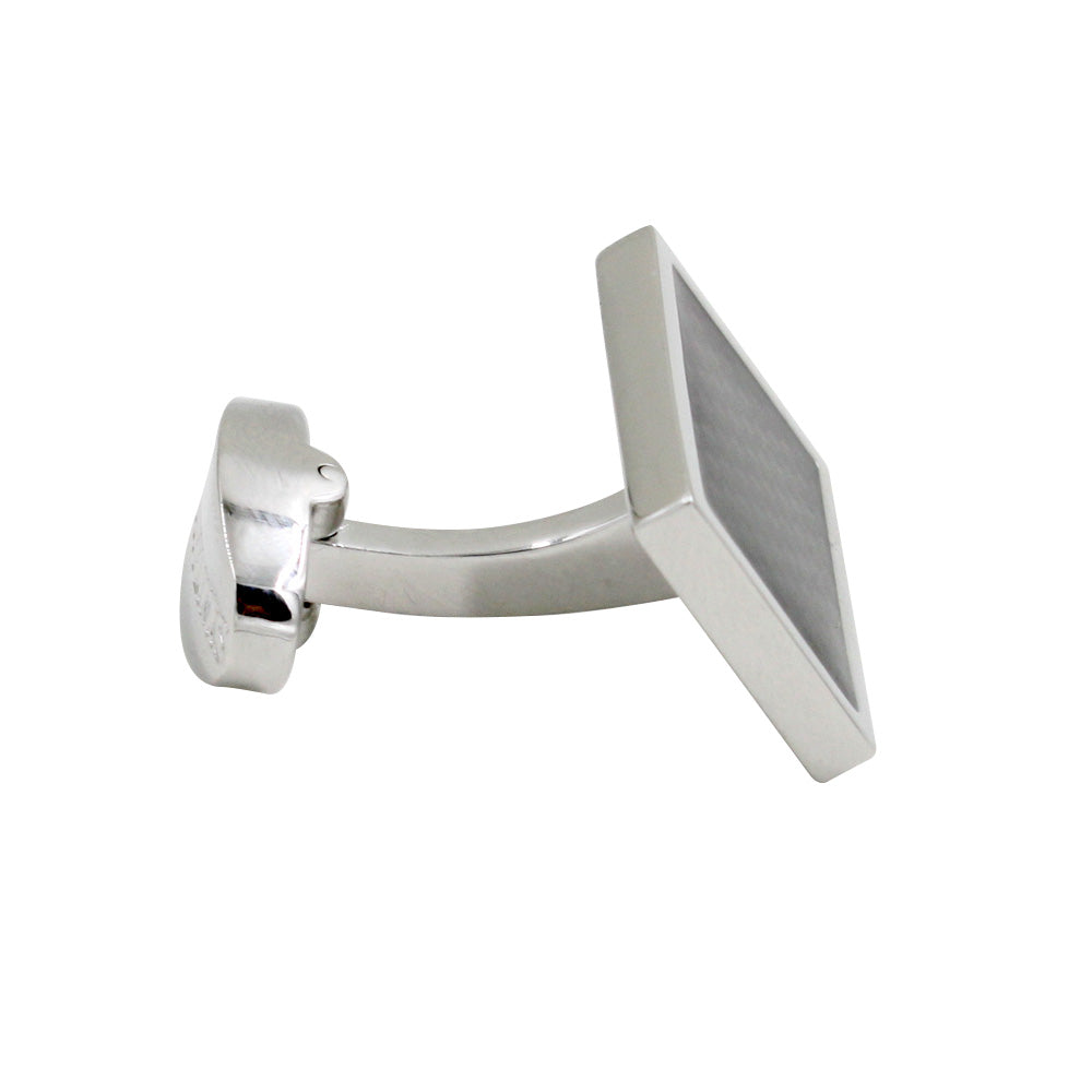 Carbon Fibre cufflinks on a white background with modern charm.
