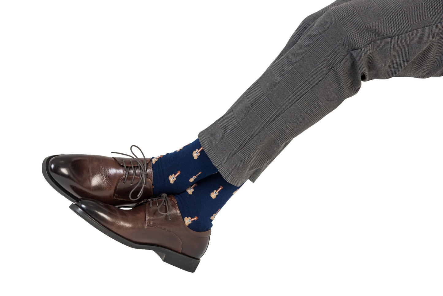 A man wearing a pair of Guitar Socks.