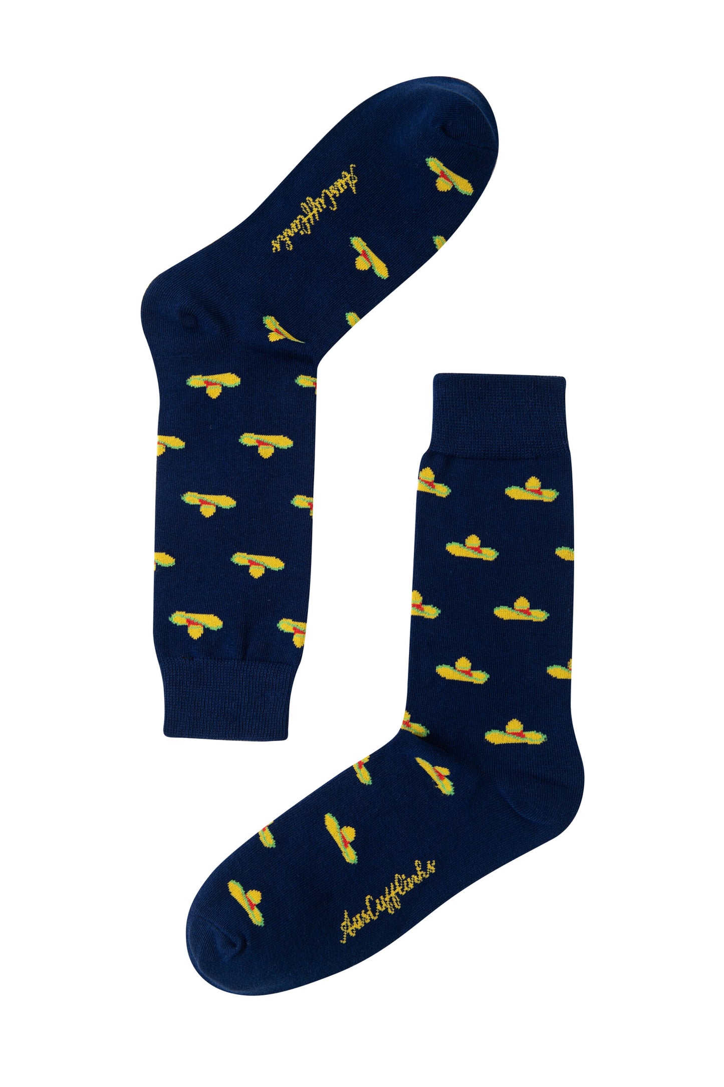 A pair of Sombrero Socks in navy blue showcases a festive pattern of yellow and orange airplanes. The word "happyfeet" is playfully written near the toes, making this footwear perfect for those who love to celebrate style.