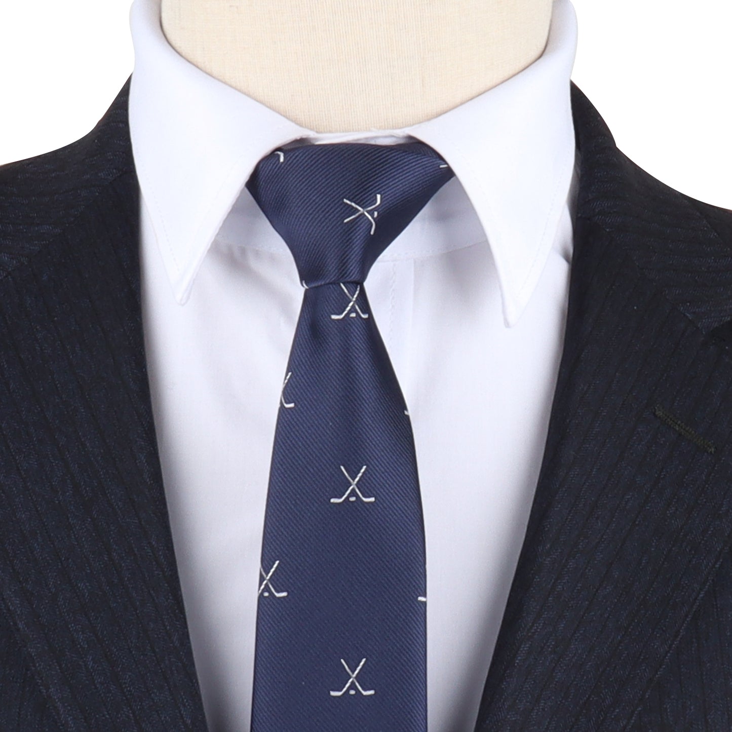 A mannequin wearing a Crossed Ice Hockey Skinny Tie and jacket, adding some style points to its icy appearance.