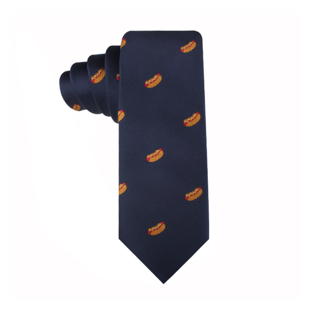 The Hotdog Thin Tie in dark blue, featuring small hot dog patterns, exudes charisma and is sure to be a culinary conversation starter.