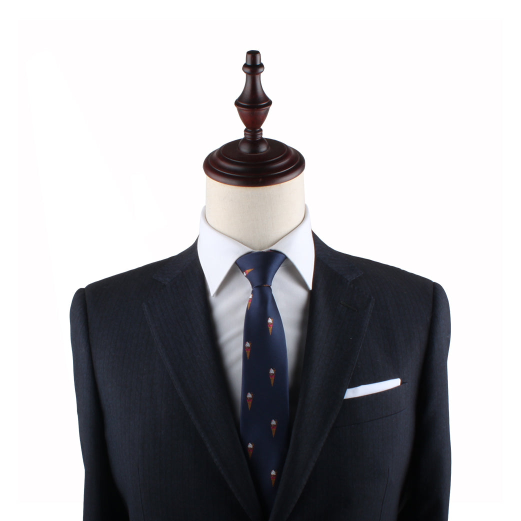 Mannequin torso showcasing a dark suit, white shirt, Ice Cream Slim Tie, and handkerchief against a white background.