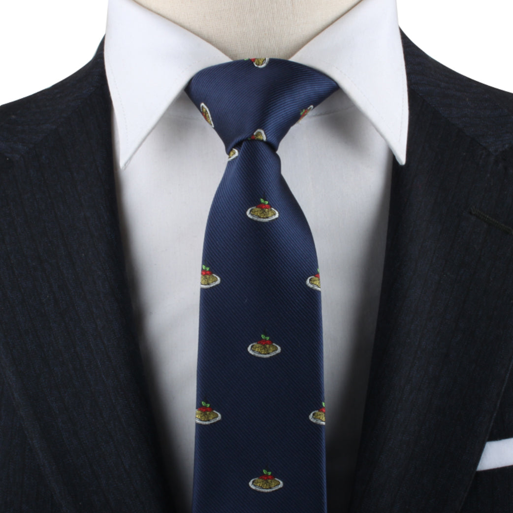 A person wearing a dark pinstripe suit with a white dress shirt and the Italian Pasta Tie, exuding Italian flair and modern style.