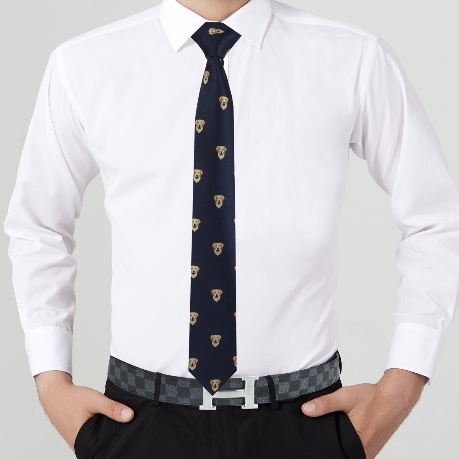 A person in a white dress shirt and black pants is wearing the stylish Labrador Retriever Gift with a small dog pattern, perfectly complementing their checkered belt—a subtle nod to dog fashion.