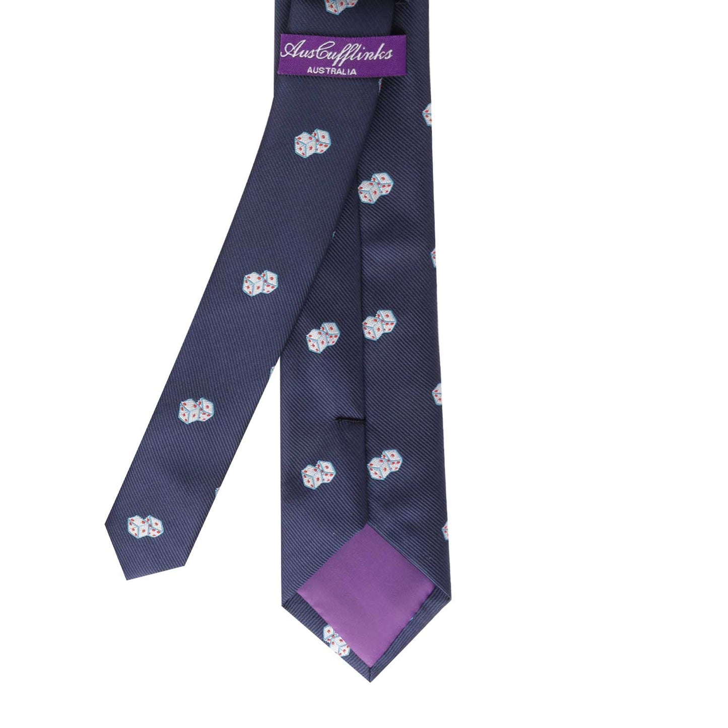 The Lucky Dice Tie, adorned with a navy blue background and small white dice patterns, adds a hint of luck and style. Its underside is purple, and it comes with a label stating "Auster & Links Australia.