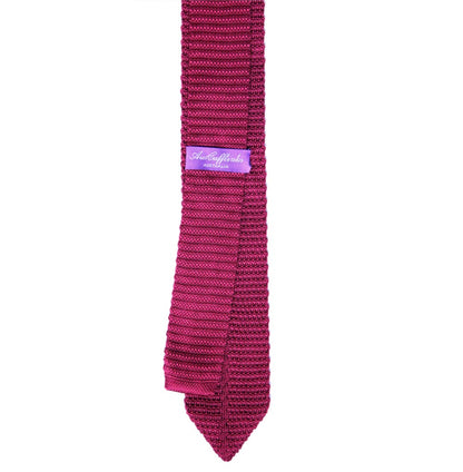 A sophisticated Burgundy Red Knit Tie on a white background.
