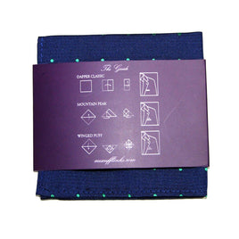 The Navy Green Polka Dot Pocket Square is a perfect men's fashion accessory and comes with a purple card detailing three folding styles: Dapper Classic, Mountain Peak, and Winged Puff.