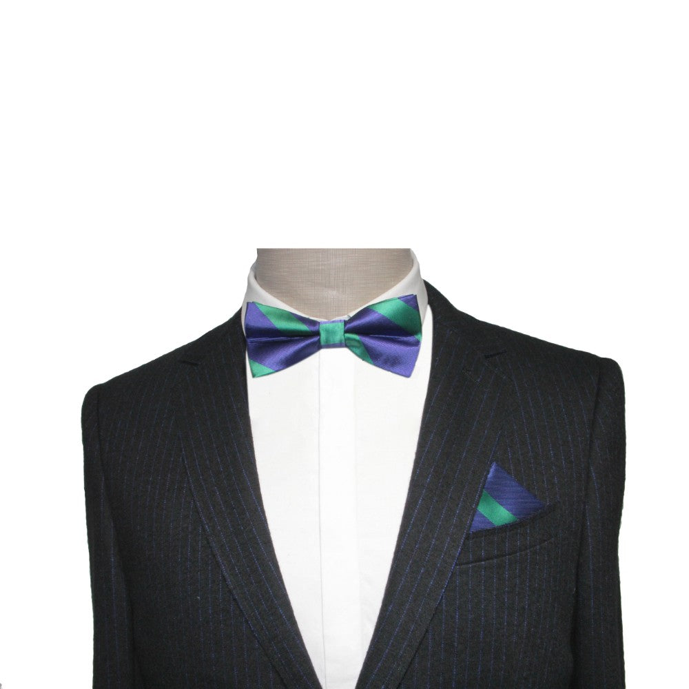 A mannequin displays a dark pinstripe suit paired with a white shirt, perfect for formal events. The ensemble is elevated by an elegant Navy Green Stripe Bow Tie and matching pocket square, adding an exquisite touch.