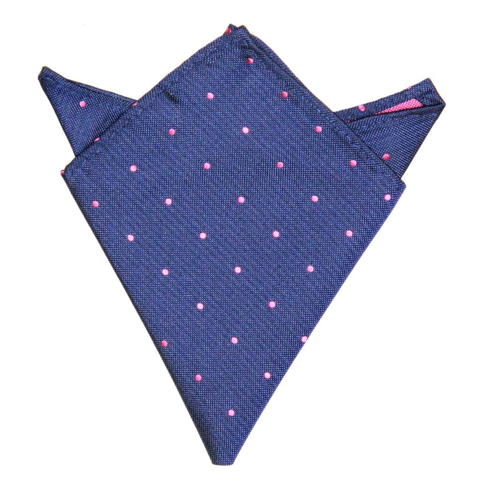 A refined folded pocket square from the Navy Pink Polka Dot Business Tie & Pocket Square Set, adorned with pink polka dots and displaying visible edges.