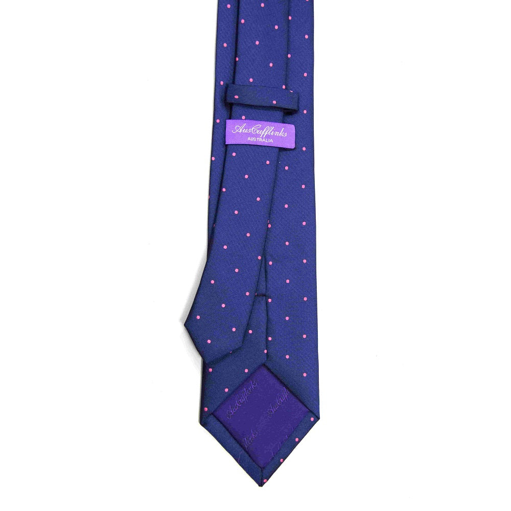 Men’s navy skinny tie with pink dots, stylish accessory for business wear, weddings, and special events.