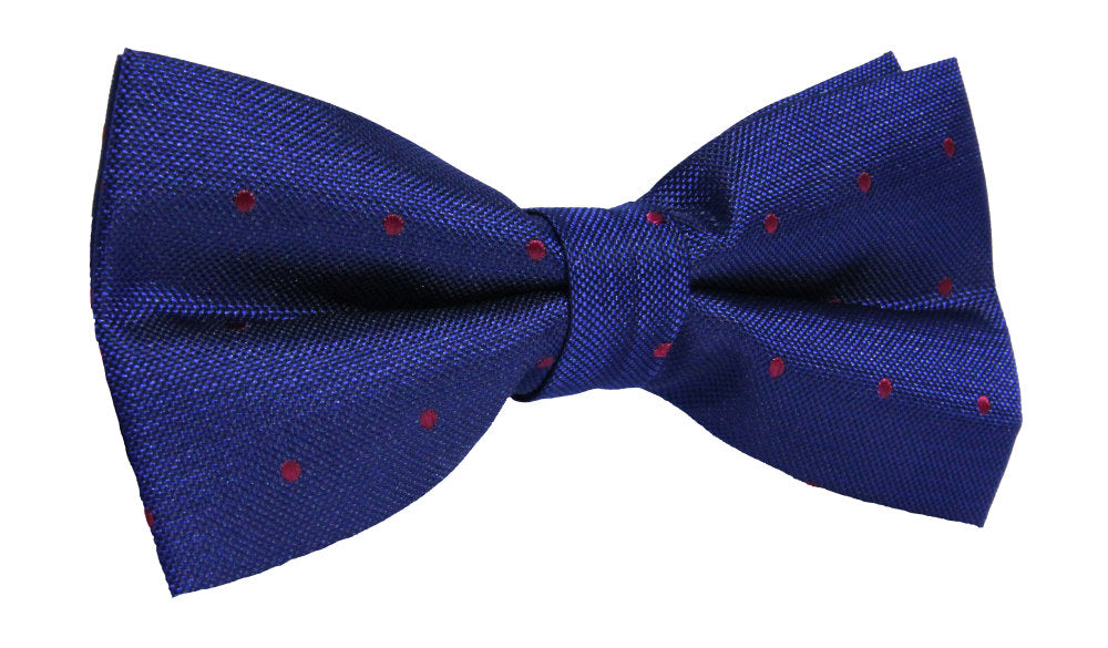 The Navy Red Polka Dot Bow Tie is a perfect formal accessory with its navy color and small red dots.