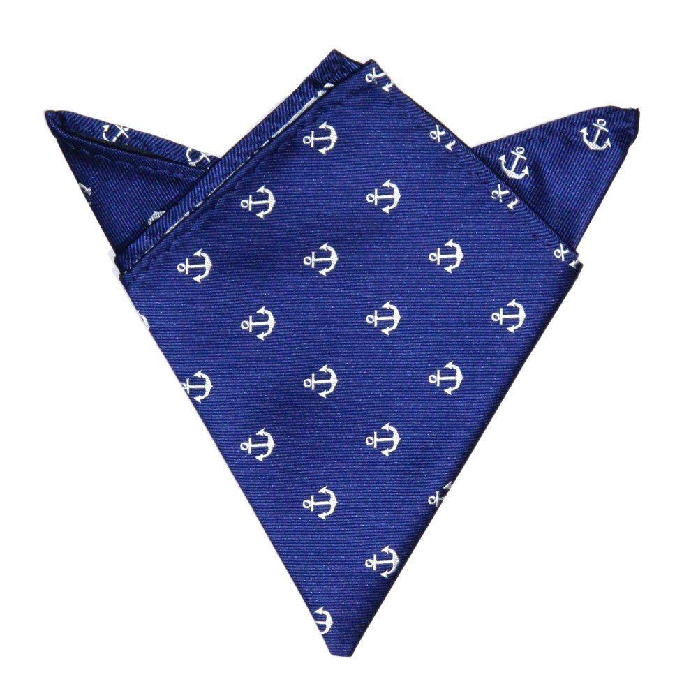 The Navy Anchor Business Tie & Pocket Square Set includes a blue pocket square with a white anchor pattern, adding nautical charm and effortlessly complementing your formal look.