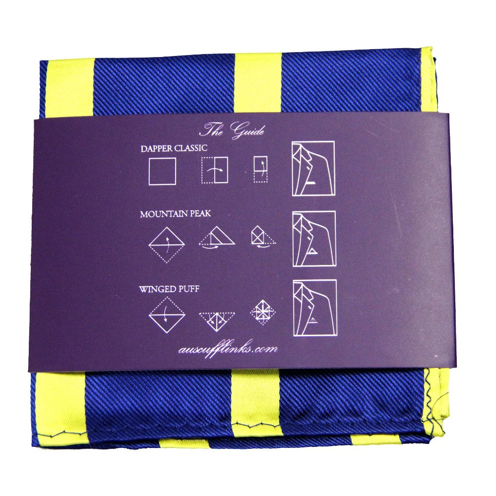 The Navy Yellow Stripe Business Tie & Pocket Square Set includes a blue and yellow striped design with an instruction card for stylish folds, making it perfect for a polished look.