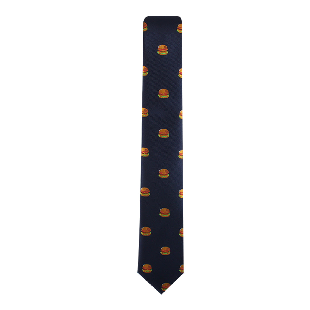 The Burger Skinny Tie in navy blue, featuring a repeating pattern of small cheeseburger images, makes a bold style statement by celebrating universally adored culinary favorites.